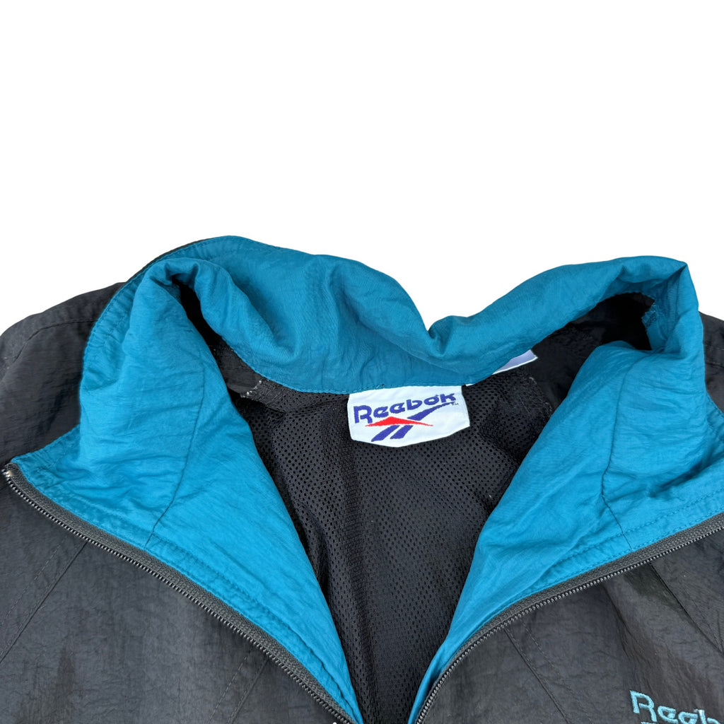 REEBOK WINDBREAKER (680)
