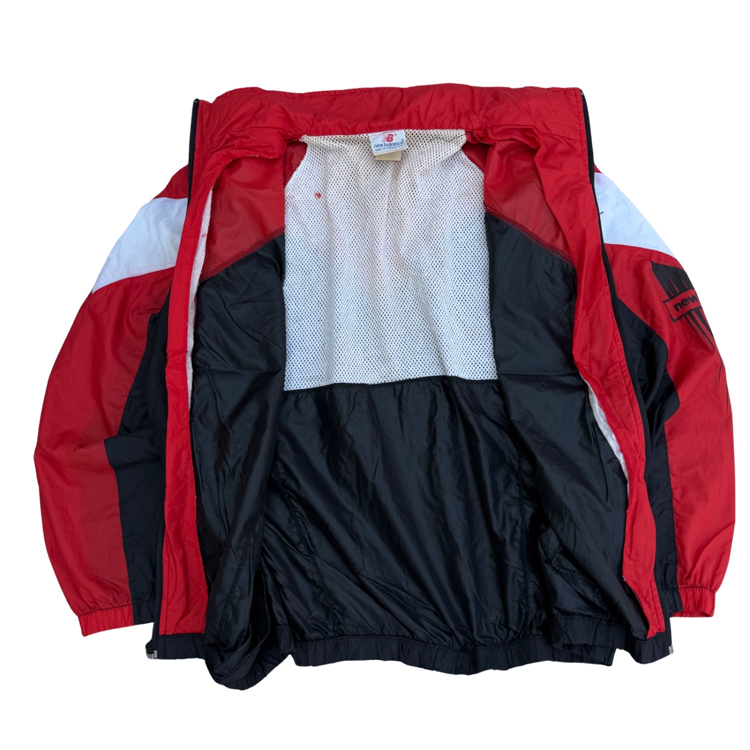 NEW BALANCE WINDBREAKER (343)